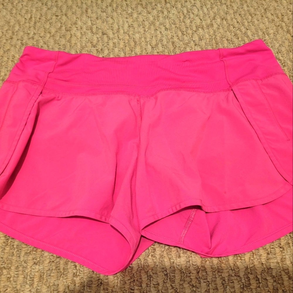 Bright Pink Athletic Shorts with Wide Waistband and Lightweight Material